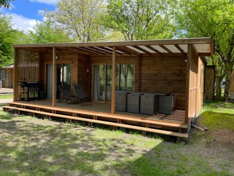 Chalet 7 personnes - Prestige 60 m² - 3 chambres - Dont terrasse couverte - Clim - TV - Lave-vaisselle - Plancha
