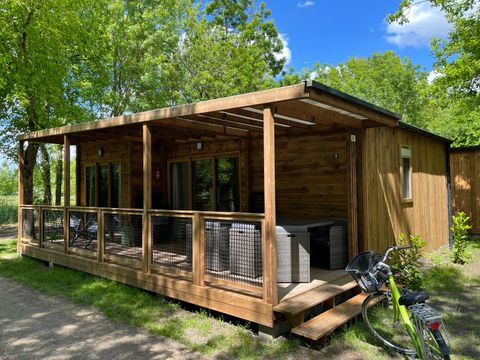 Chalet 7 personnes - Prestige 60 m² - 3 chambres - Dont terrasse couverte - Clim - TV - Lave-vaisselle - Plancha