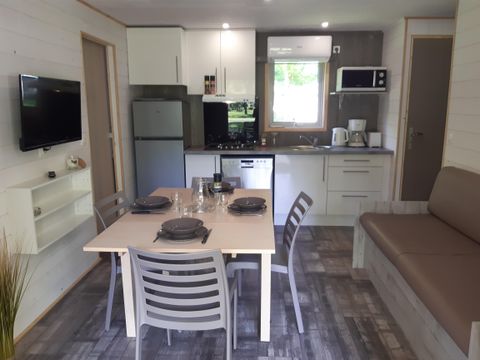 Chalet 6 personnes - PREMIUM 48 m² - 3 chambres - Dont terrasse semi-couverte - TV+ lave-vaisselle - Clim - Plancha