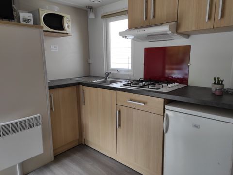 MOBILHOME 4 personnes - LOCATION MOBILHOME TI 26m² avec terrasse semi-couverte (2 chambres) 4 pers. CONFORT 4 pers