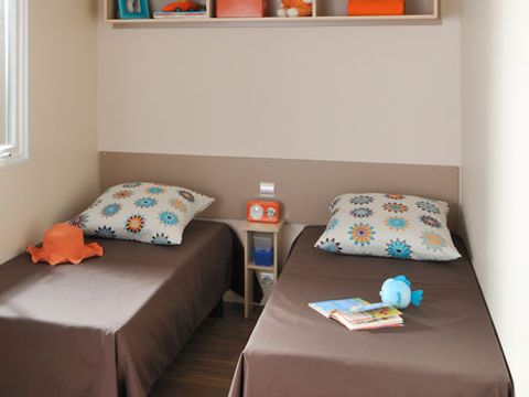 MOBILHOME 6 personnes - LOCATION MOBILHOME TI 32m² avec terrasse semi-couverte (3 chambres) ECO 6 pers