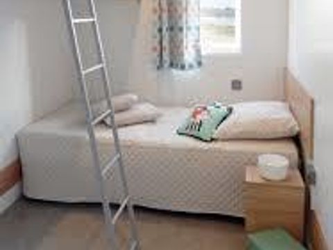 Mobilhome 4 personnes - PMR Confort 34 m² - 2 chambres - Terrasse couverte - Clim