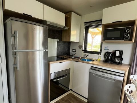 MOBILHOME 4 personnes - Mobil-Home Privilège 2 ch., 2 sdb, 34m² + terrasse 15 m² + climatisation