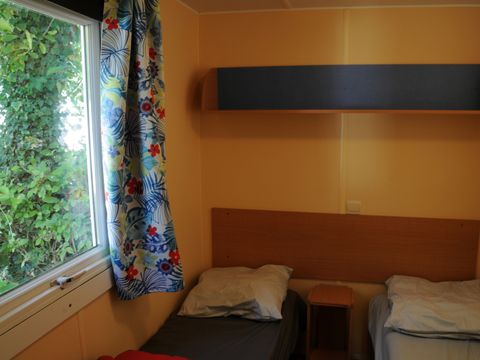 Mobilhome 4 personnes - Damgan - STANDARD 21 m² - 2 chambres - Terrasse couverte - TV