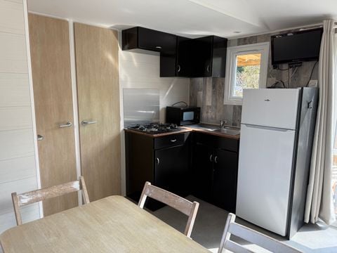 MOBILHOME 6 personnes - CLASSIC 30-3  >10ans - maxi 4 adultes - TV, 3 chambres, environ 30m²