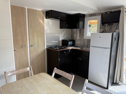MOBILHOME 6 personnes - CLASSIC 30-3  >10ans - maxi 4 adultes - TV, 3 chambres, environ 30m²