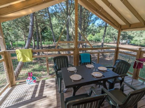 Insolite 5 personnes - INSOLITE 25-2 (Cabane sur pilotis Ecologe) >10ans ; maxi 4 adultes (Lits superposés) TV