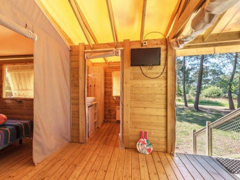 Insolite 5 personnes - INSOLITE 25-2 (Cabane sur pilotis Ecologe) >10ans ; maxi 4 adultes (Lits superposés) TV