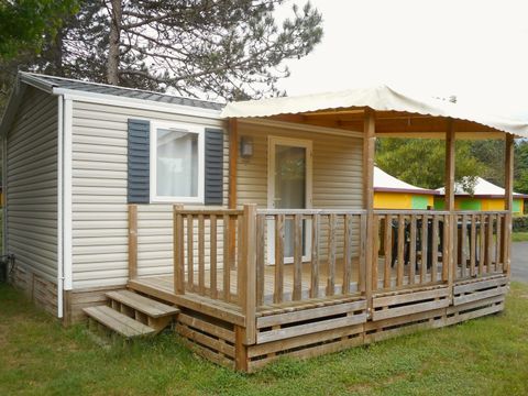 Mobilhome 2 personnes - Confort 21m² 1 chambre + terrasse semi-couverte 12m² + TV + Climatisation