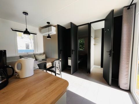 Mobilhome 4 personnes - NEW -Standard Plus 26m² 2 chambres + Terrasse + TV + Climatisation