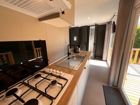 Mobilhome 4 personnes - NEW -Standard Plus 26m² 2 chambres + Terrasse + TV + Climatisation