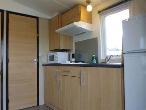 MOBILHOME 2 personnes - Mobil home IRIS- 1 chambre - cuisine - salle de bain - terrasse couverte -