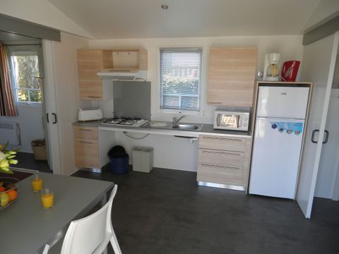 MOBILHOME 4 personnes - Standard 32m² - 2 chambres + terrasse non-couverte - PMR