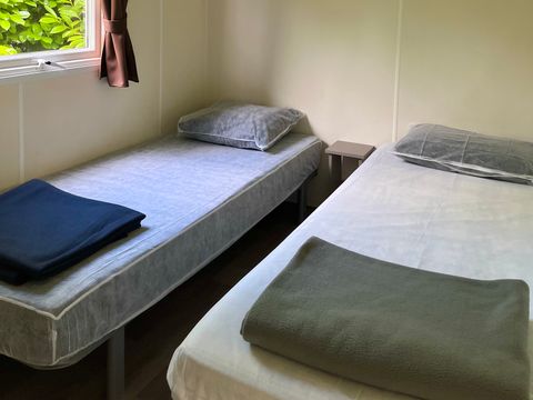 Mobilhome 2 personnes - 15m² - 1 chambre avec 2 lits - Simples - Sans terrasse