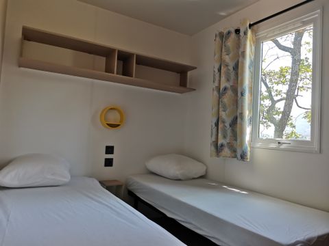 MOBILHOME 4 personnes - Mobil-home Premium 29m² - 2 chambres + terrasse semi-couverte + TV + LV + clim + draps inclus