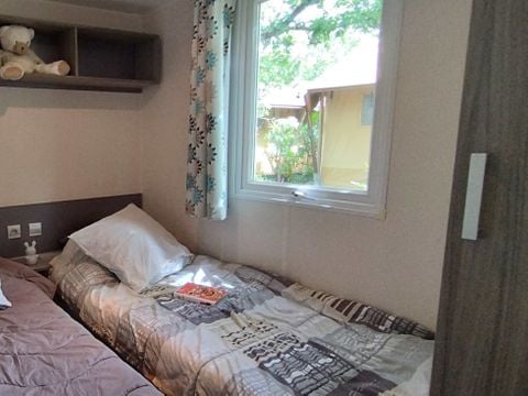 Mobilhome 6 personnes - Standard 29m² - 3 chambres - Terrasse - TV - Clim