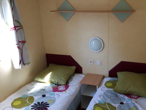 MOBILHOME 4 personnes - Mobil home Confort 2 chambres 28m² + terrasse 9m² + climatisation + TV 4 pers