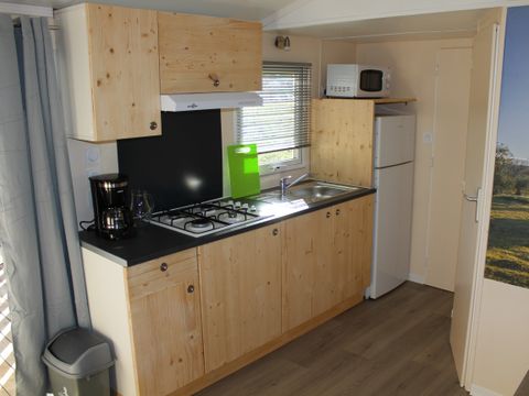 MOBILHOME 4 personnes - Mobil home Confort 2 chambres 28m² + terrasse 9m² + climatisation + TV 4 pers