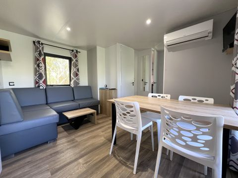 Mobilhome 6 personnes - Mobil-home Premium 32 m² 3 chambres + terrasse 21m² + TV + LV + clim + plancha 6 pers