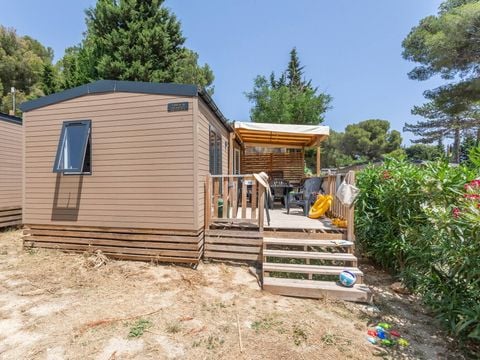 MOBILHOME 6 personnes - Mobil-home Homair Vacances au camping Domaine de Miremer | Comfort | 3 Ch. | 6 Pers. | Terrasse surélevée | Clim.