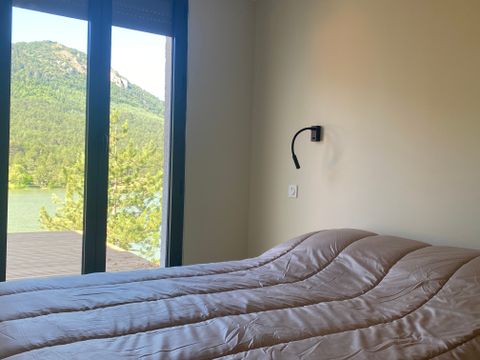 VILLA 2 personnes - Villa 58m² Confort - 1 chambre + Terrasse Vue Lac + TV 2 pers