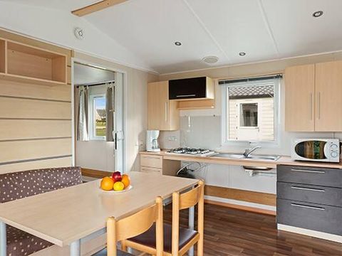 MOBILHOME 4 personnes - PMR | Comfort | 2 Ch. | 4 Pers. | Terrasse surélevée non couverte | Clim.