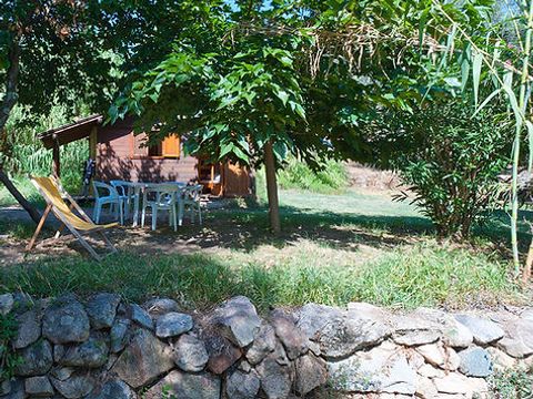 CHALET 4 personnes - GRAND - petit déjeuner, draps et linge inclus - sans cuisine - sanitaires commun