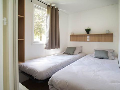 Mobilhome 4 personnes - Nest29 30,8 m²- 2 chambres + Terrasse couverte + TV