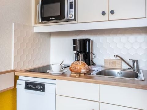 STUDIO 4 personnes - Studio 4 personnes, 1 coin nuit, balcon, climatisé, vue cour, rénové