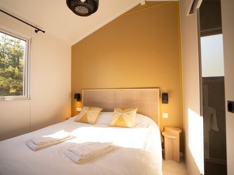 Lodge 4 personnes - Ethnique - Sans spa - 1 chambre - Canapé convertible séjour