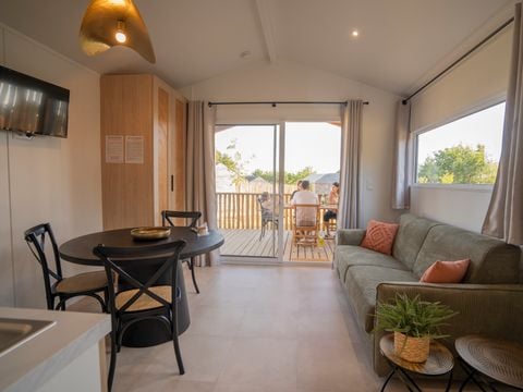 Lodge 4 personnes - Ethnique - Sans spa - 1 chambre - Canapé convertible séjour
