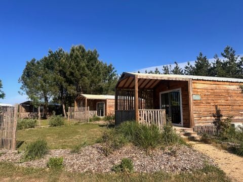 Lodge 4 personnes - Ethnique - Sans spa - 1 chambre - Canapé convertible séjour