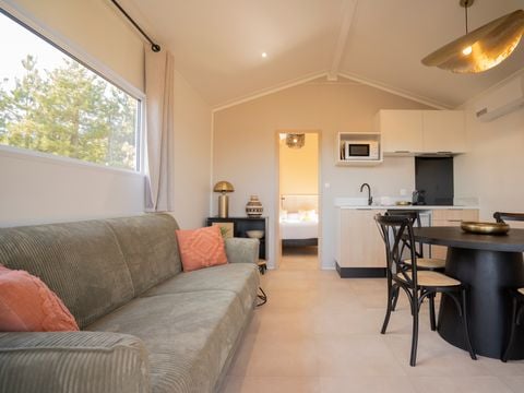LODGE 4 personnes - Lodge Ethnique (sans spa) 1 chambre + canapé convertible séjour
