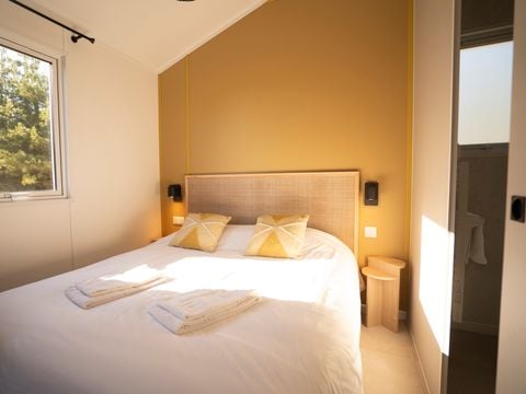 Lodge 4 personnes - Ethnique - Sans spa - 1 chambre - Canapé convertible séjour