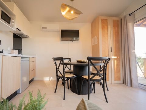 Lodge 4 personnes - Ethnique - Sans spa - 1 chambre - Canapé convertible séjour