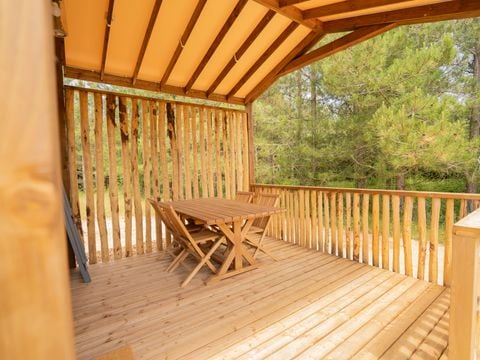 Lodge 4 personnes - Ethnique - Sans spa - 1 chambre - Canapé convertible séjour