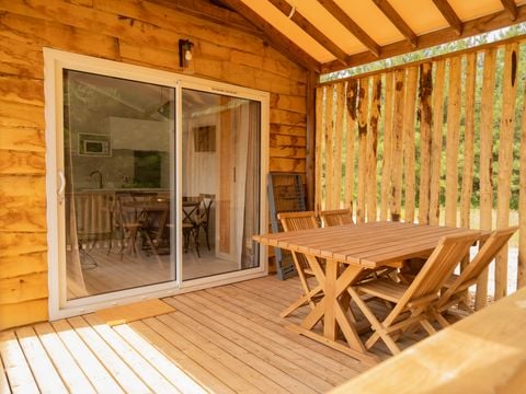 Lodge 4 personnes - Ethnique - Sans spa - 1 chambre - Canapé convertible séjour