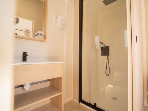 Lodge 4 personnes - Ethnique - Sans spa - 1 chambre - Canapé convertible séjour