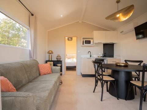 LODGE 4 personnes - Lodge Ethnique (sans spa) 1 chambre + canapé convertible séjour