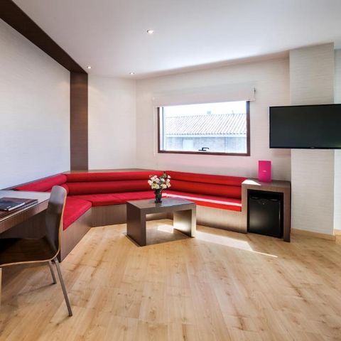 Habitación 4 personas - Habitación de hotel Junior Suite (2 adultos + 2 niños)
