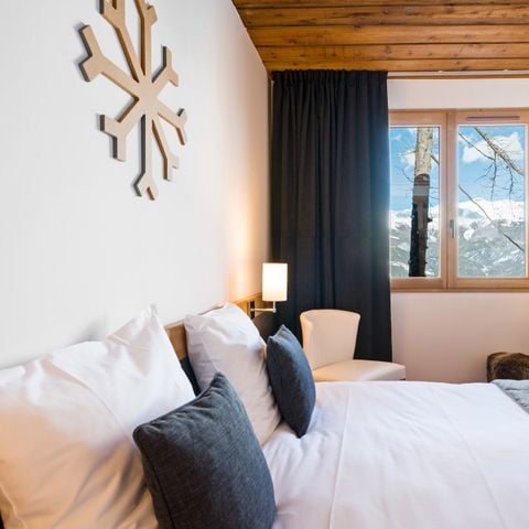 Hotelkamer 4 personen - Deluxe Familiekamer - Uitzicht op de Hellingen & Balkon (Logies en Ontbijt)