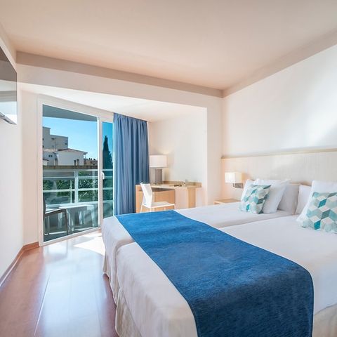 Slaapkamer 2 personen - Tweepersoonskamer Deluxe - Uitzicht op zee - Balkon