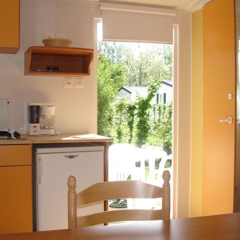 MOBILHOME 8 personnes - Mobil home Confort 31m² / 3 chambres + TV + Terrasse non couverte 6/8 pers
