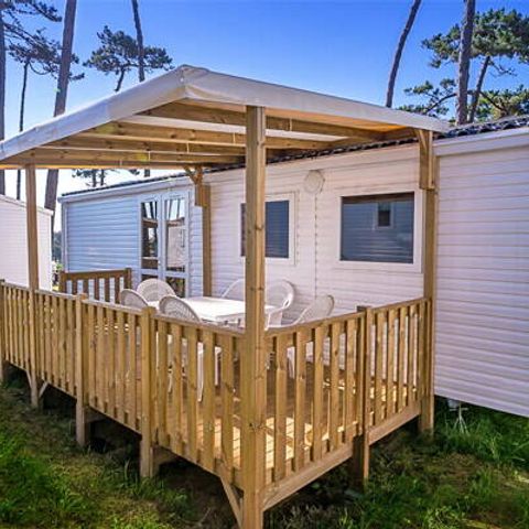 Bungalow 6 personen - Mobilheim | Comfort | 3 Zi. | 6 Pers. | Erhöhte Terrasse | Clim.