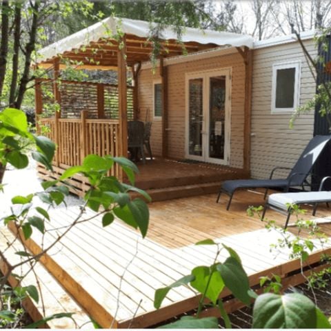 Mobilhome 6/8 personnes - Confort 32m² - 3 chambres - Terrasse semi-couverte - TV