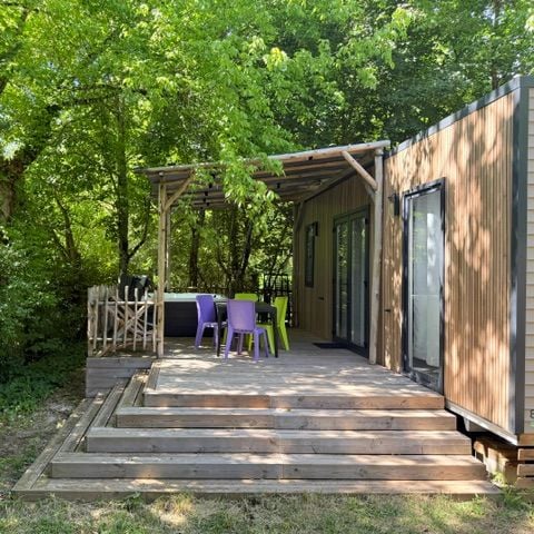 MOBILHOME 4 personnes - Mobil-home Premium 30m² 2 chambres + terrasse 25m² - TV - Clim - Spa 1/4 pers