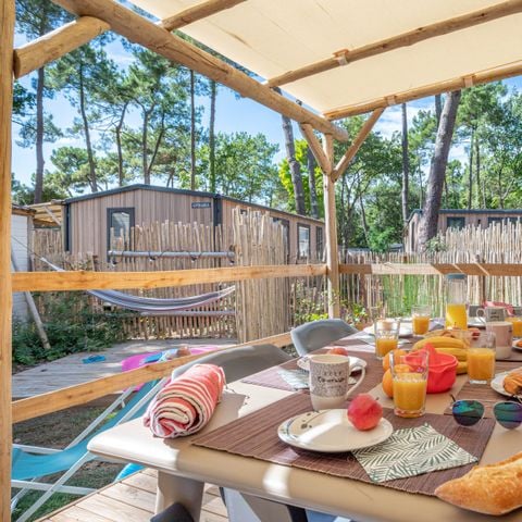Mobilhome 4 personnes - Garden - 2 chambres-CLIM-baignoire-TV-lave-vaisselle-plancha-terrasse - Couverte-31m² - PREMIUM