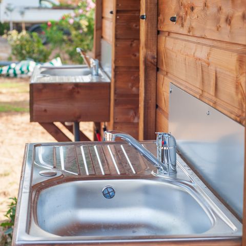 PLOT - Premium package with private sanitary facilities (1 tent, caravan or motor home/1 car + 16A electricity)