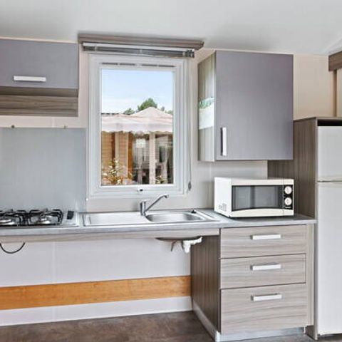 Stacaravan 4 personen - Mobile-home PMR | Comfort | 2 slaapkamers | 4 pers. | Verhoogd terras | Airconditioning.