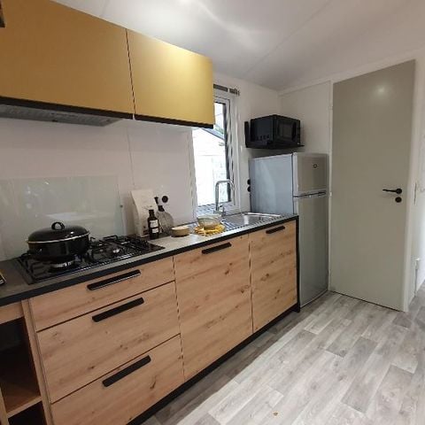 Mobile home 4 persons - 25m2 (2021) + Semi-covered wooden terrace 8m2. Sleeps 4